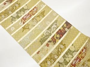 横段に草花・古典柄・片輪車模様織出し袋帯